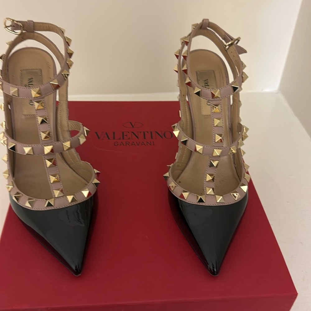 Very good condition Valentino  heels  in black and gold studs